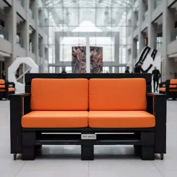 Аренда Диван из паллет двухместный обожженный оранжевый в казино «Сочи» — ART SPACE